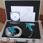 The cryotherapy system carried by Dr. Venkatraman included the cryotherapy gun, brass tips (in plastic bag) and tubing to connect the gun to the nitrous oxide refrigerant. The case containing the system fit into a suitcase.